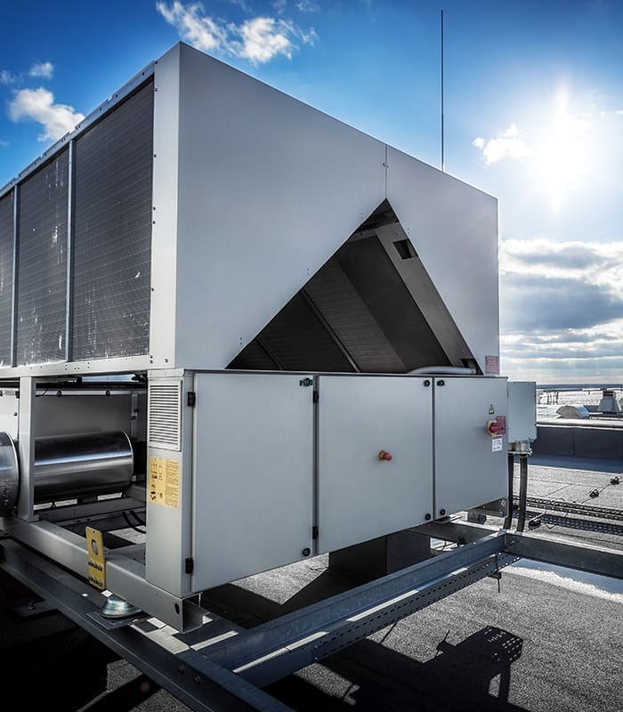 air conditioner unit installed at commercial building rooftop peyton co