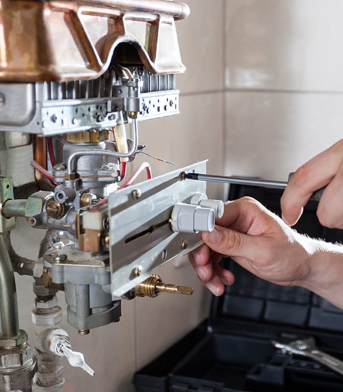 technician hands with screwdriver close up repairing boiler peyton co technician hands with screwdriver close up repairing boiler peyton co
